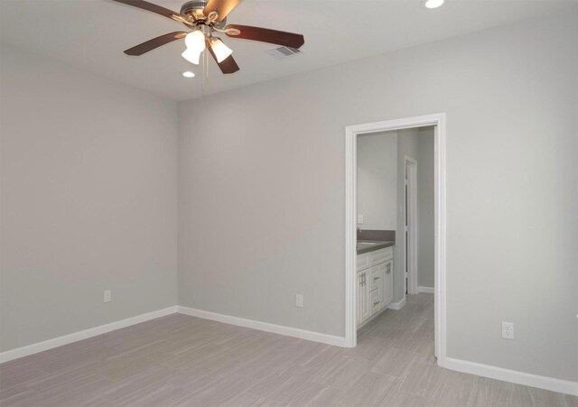 5801 Phillips St, Houston, TX 77091 - empty room featuring ceiling fan, recessed lighting, baseboards, and light wood-type flooring