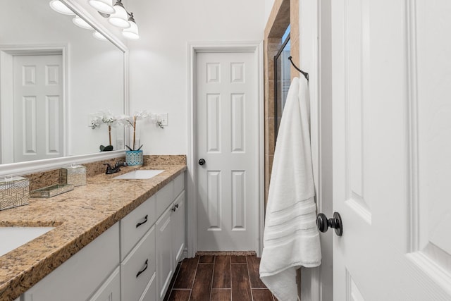 1603 Culture Ln, College Station, TX 77845 - full bathroom featuring double vanity, wood tiled floors, and a shower with shower curtain