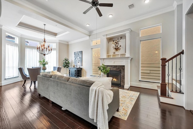 2010 Sabine St, Houston, TX 77007 - living area featuring dark wood-style floors, ceiling fan, a chandelier, a high end fireplace, and stairway
