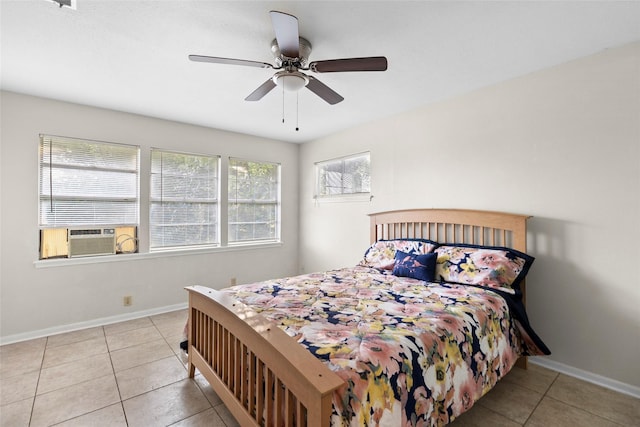 7 Lake Dr, Huntsville, TX 77320 - bedroom featuring tile patterned flooring, cooling unit, baseboards, and ceiling fan