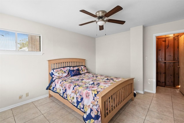 7 Lake Dr, Huntsville, TX 77320 - bedroom featuring tile patterned floors, baseboards, and ceiling fan