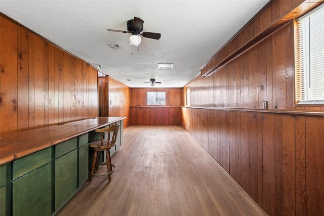 7 Lake Dr, Huntsville, TX 77320 - corridor featuring wooden walls and wood finished floors