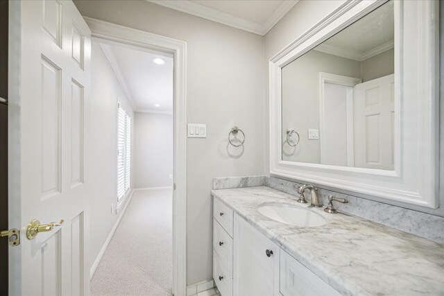 2901 Bammel Ln Unit 17, Houston, TX 77098 - bathroom featuring vanity, ornamental molding, baseboards, and recessed lighting
