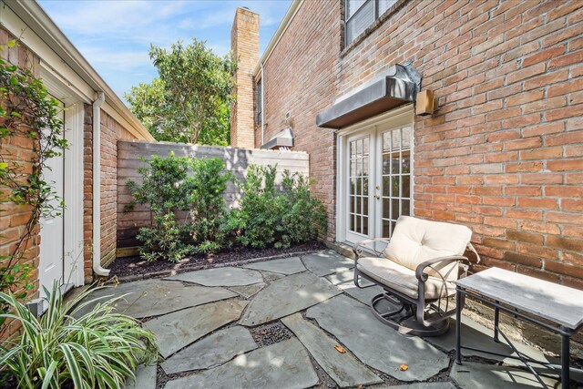 2901 Bammel Ln Unit 17, Houston, TX 77098 - view of patio / terrace featuring french doors