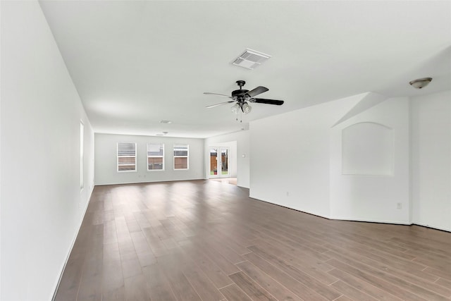 461 Mystic Glen Loop, Houston, TX 77339 - unfurnished living room featuring a ceiling fan and wood finished floors