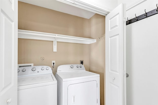 461 Mystic Glen Loop, Houston, TX 77339 - laundry area with separate washer and dryer