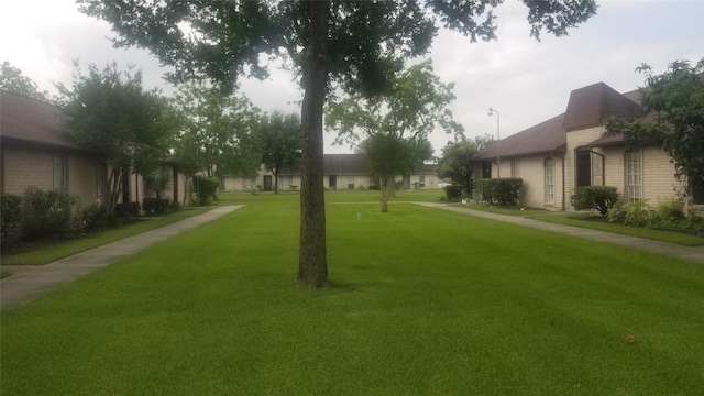 7267 Cook Rd, Houston, TX 77072 - view of property's community featuring a lawn