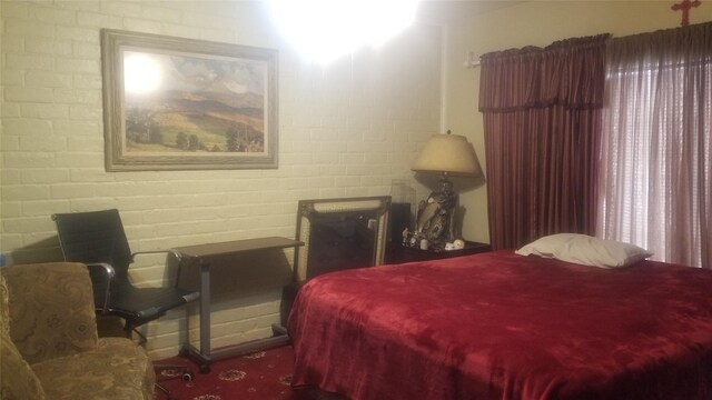 7267 Cook Rd, Houston, TX 77072 - bedroom featuring brick wall