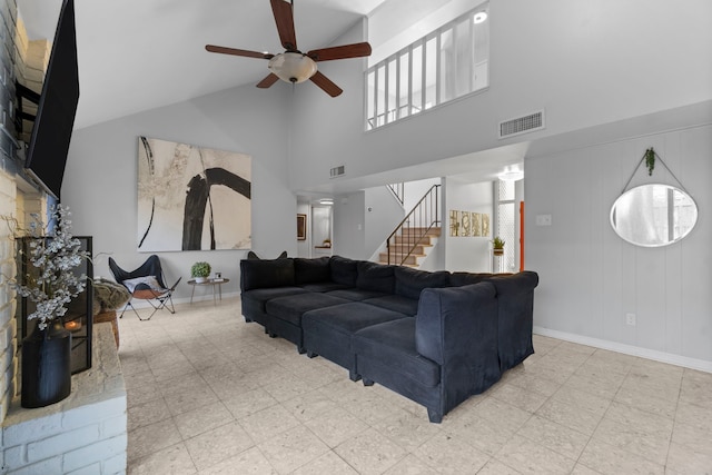 1919 Shadowdale Dr, Houston, TX 77043 - living area with a towering ceiling, ceiling fan, stairway, and baseboards