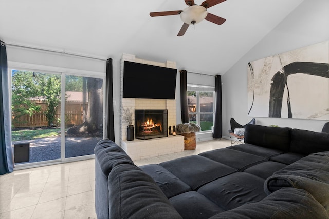 1919 Shadowdale Dr, Houston, TX 77043 - living area featuring a ceiling fan, healthy amount of natural light, a fireplace, high vaulted ceiling, and tile patterned flooring