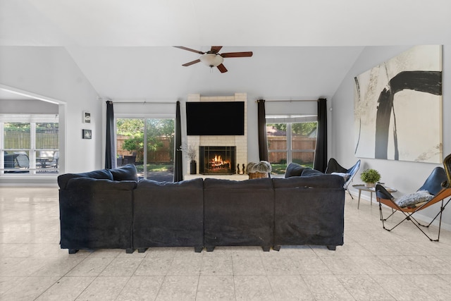 1919 Shadowdale Dr, Houston, TX 77043 - living room with lofted ceiling, a ceiling fan, plenty of natural light, and a fireplace
