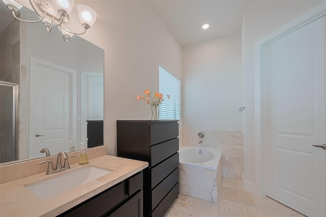 72 N Hutcheson St, Houston, TX 77003 - full bath with vanity, a bath, an enclosed shower, a chandelier, and recessed lighting