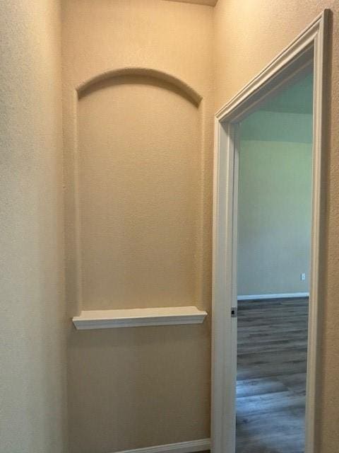 995 Arbor Gln, Conroe, TX 77303 - detailed view of wood finished floors and baseboards