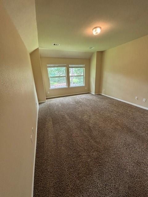995 Arbor Gln, Conroe, TX 77303 - unfurnished room featuring carpet and baseboards