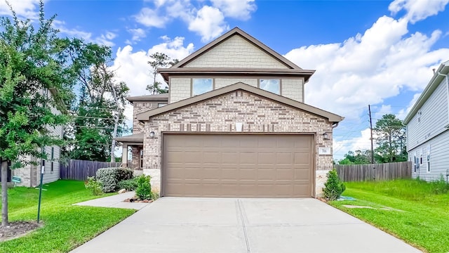 706 Hardwood Grove Ct, Houston, TX 77090 - view of front of home featuring stone siding, driveway, and a garage