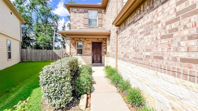 706 Hardwood Grove Ct, Houston, TX 77090 - doorway to property with brick siding and stone siding