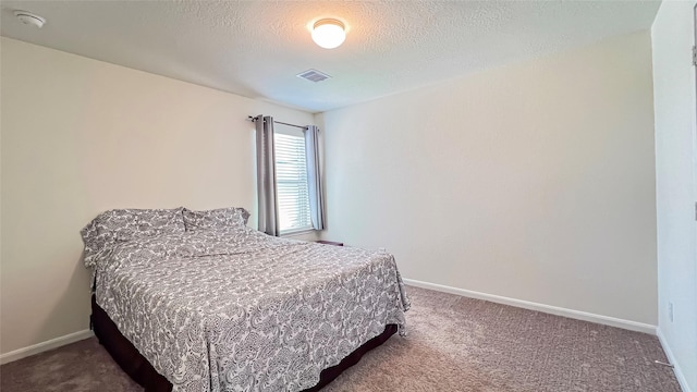706 Hardwood Grove Ct, Houston, TX 77090 - bedroom with carpet flooring, baseboards, and a textured ceiling