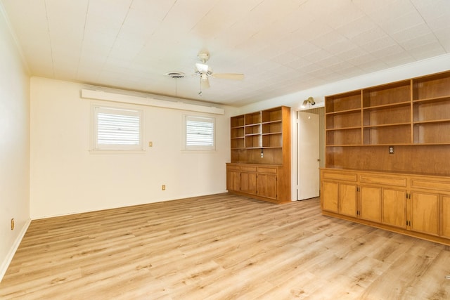 204 Caladium St, Lake Jackson, TX 77566 - unfurnished living room with light wood-style floors and ceiling fan