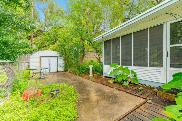 204 Caladium St, Lake Jackson, TX 77566 - fenced backyard with a sunroom