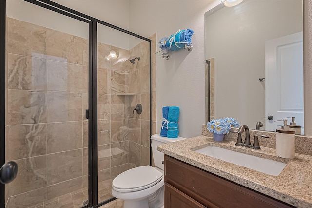 10002 Hutton Park Dr, Katy, TX 77494 - bathroom with vanity, a shower stall, and toilet