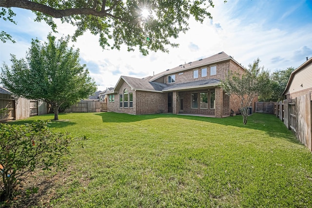10002 Hutton Park Dr, Katy, TX 77494 - back of property with brick siding