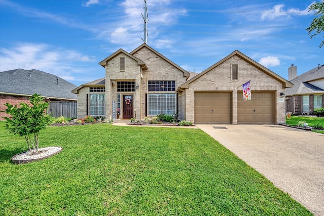 2206 E Van Trease Dr, Deer Park, TX 77536 - french provincial home featuring brick siding, a garage, and concrete driveway