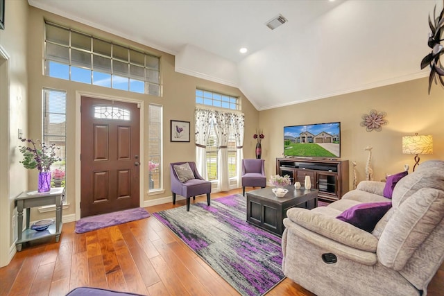 2206 E Van Trease Dr, Deer Park, TX 77536 - living area featuring hardwood / wood-style flooring, baseboards, ornamental molding, recessed lighting, and high vaulted ceiling