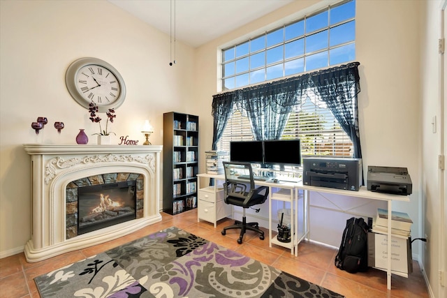 2206 E Van Trease Dr, Deer Park, TX 77536 - home office featuring tile patterned flooring and a premium fireplace