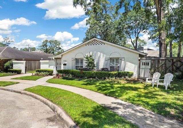 12302 Overcup Dr, Houston, TX 77024 - view of front of property featuring brick siding