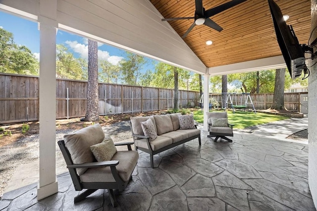 12302 Overcup Dr, Houston, TX 77024 - fenced backyard featuring an outdoor hangout area, a patio, and a ceiling fan