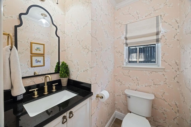 12302 Overcup Dr, Houston, TX 77024 - bathroom with vanity, toilet, and crown molding
