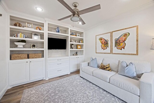 12302 Overcup Dr, Houston, TX 77024 - living room with wood finished floors, crown molding, a ceiling fan, and built in shelves
