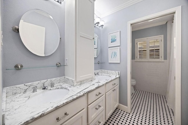 12302 Overcup Dr, Houston, TX 77024 - full bathroom featuring crown molding, double vanity, and toilet