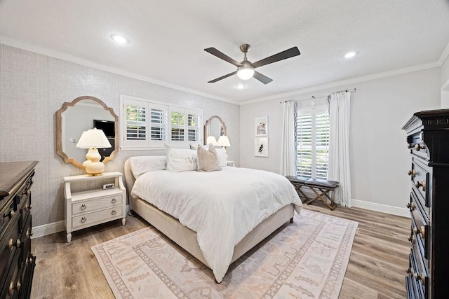 12302 Overcup Dr, Houston, TX 77024 - bedroom with crown molding, baseboards, light wood-type flooring, a ceiling fan, and recessed lighting