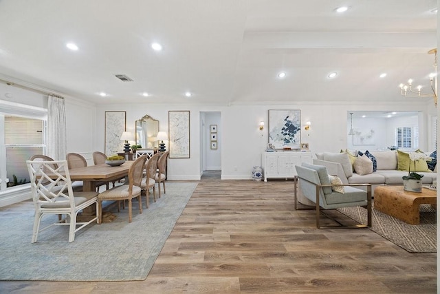 12302 Overcup Dr, Houston, TX 77024 - dining space with crown molding, wood finished floors, a chandelier, recessed lighting, and baseboards