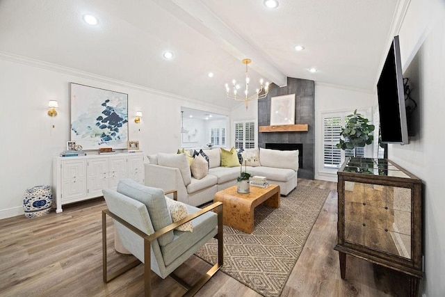 12302 Overcup Dr, Houston, TX 77024 - living area with light wood finished floors, a chandelier, recessed lighting, crown molding, and baseboards