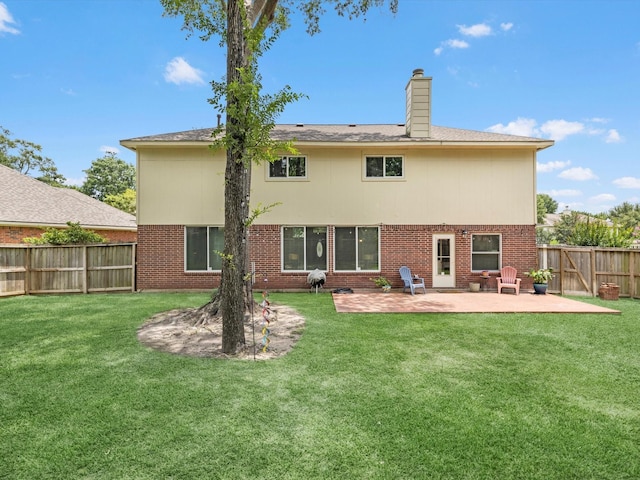 2710 Magnolia Walk, Spring, TX 77388 - rear view of house featuring a patio area, brick siding, and a chimney