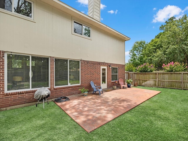 2710 Magnolia Walk, Spring, TX 77388 - rear view of property with a patio, brick siding, and a chimney