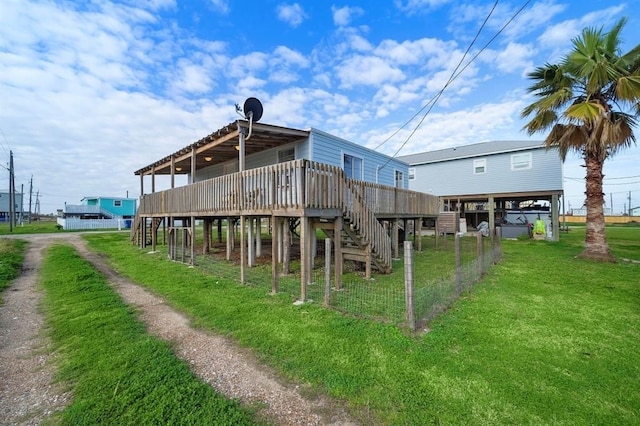 514 Texas, Surfside Beach, TX 77541 - rear view of house with a wooden deck and stairway