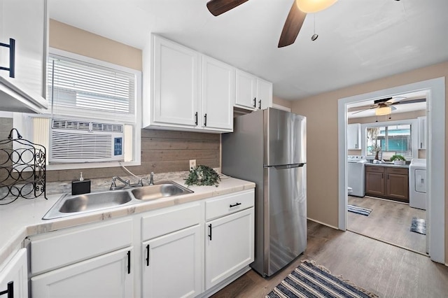 514 Texas, Surfside Beach, TX 77541 - kitchen featuring freestanding refrigerator, washer / clothes dryer, and a ceiling fan