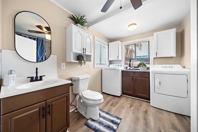 514 Texas, Surfside Beach, TX 77541 - full bath with a ceiling fan, vanity, wood finished floors, and washing machine and dryer