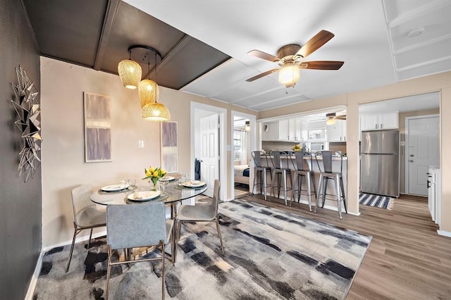 514 Texas, Surfside Beach, TX 77541 - dining area featuring a ceiling fan and wood finished floors