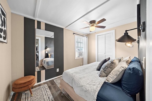 514 Texas, Surfside Beach, TX 77541 - bedroom featuring wood finished floors, a closet, and ceiling fan