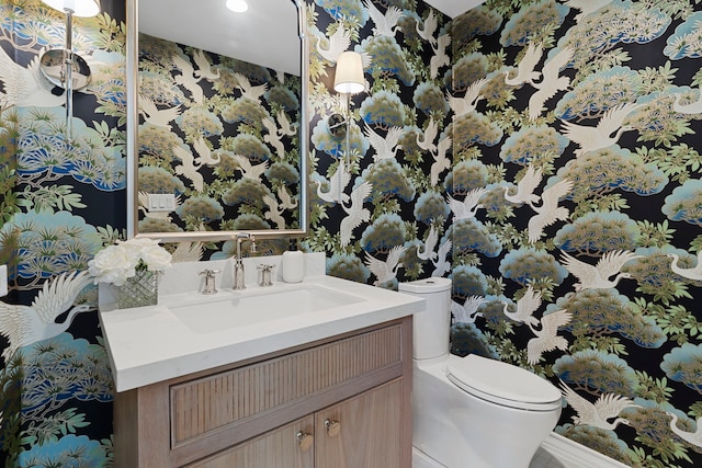 102 Lanai St, Tiki Island, TX 77554 - bathroom featuring vanity, toilet, recessed lighting, and wallpapered walls