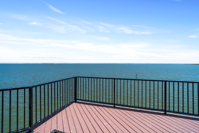 102 Lanai St, Tiki Island, TX 77554 - wooden deck featuring a water view