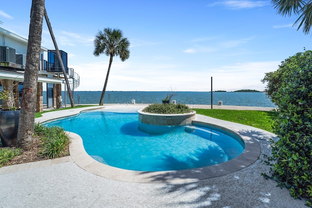 102 Lanai St, Tiki Island, TX 77554 - swimming pool with stairway and a water view