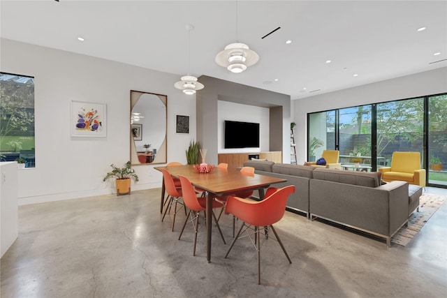 1136 Aurora St, Houston, TX 77009 - dining space featuring concrete floors and recessed lighting