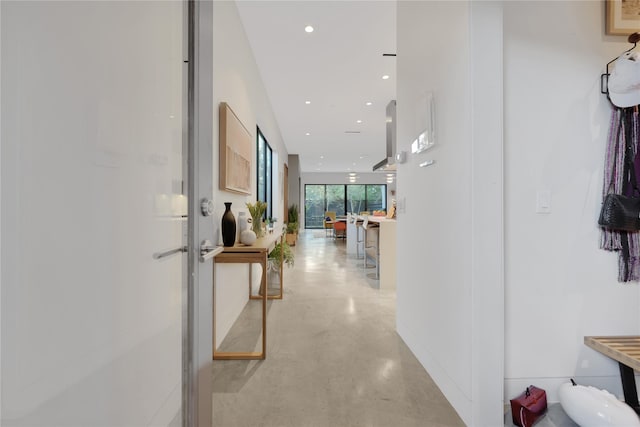1136 Aurora St, Houston, TX 77009 - hallway with concrete flooring and recessed lighting