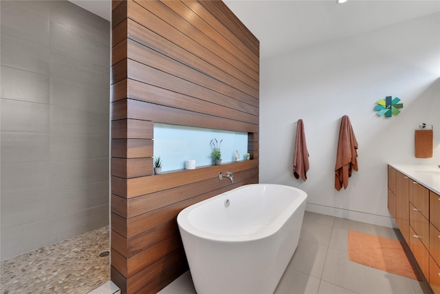 1136 Aurora St, Houston, TX 77009 - bathroom featuring a freestanding bath, vanity, tile patterned flooring, and walk in shower