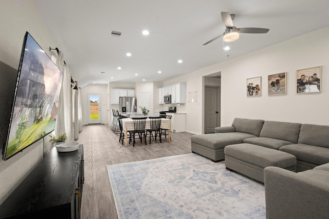 20010 Sienna Green Dr, Hockley, TX 77447 - living room with ceiling fan, light wood-style floors, and recessed lighting